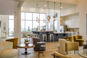 social lounge and resident demonstration kitchen   at Reveal Skyline apartments